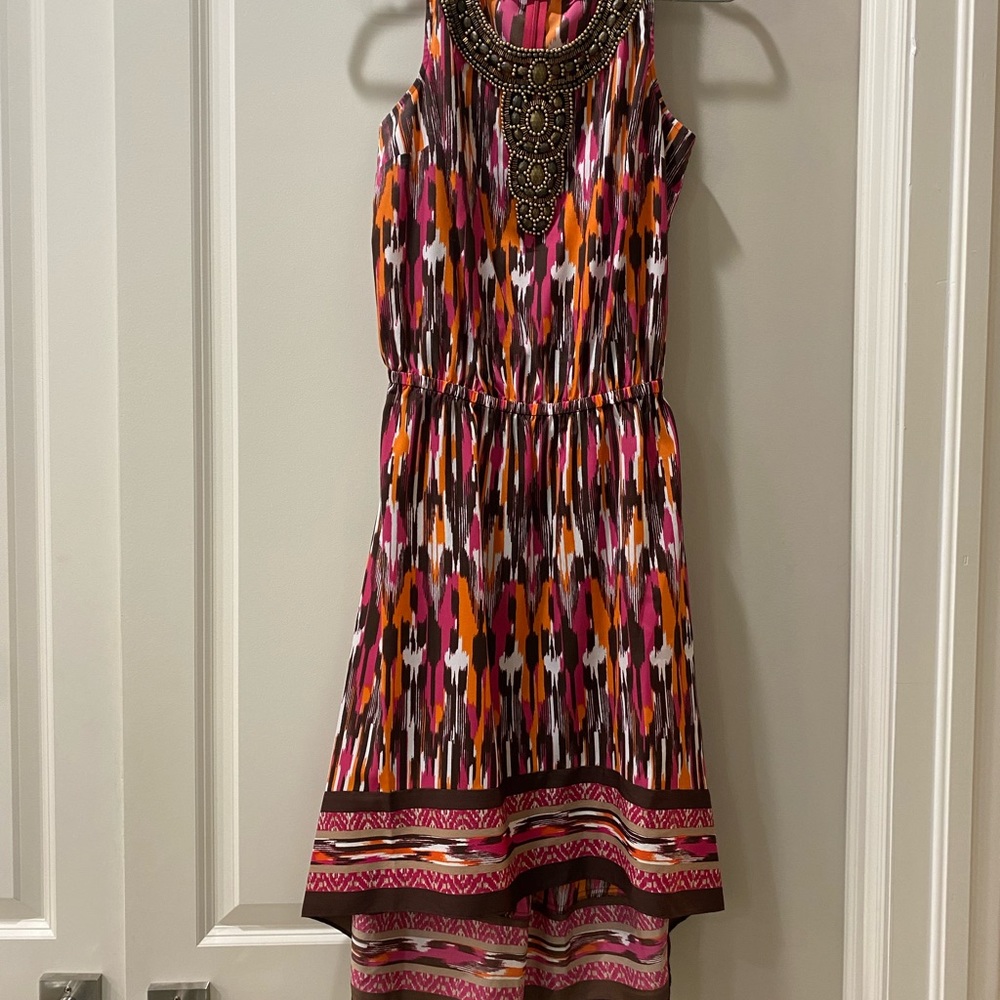 Michael kors size 6 dress. Worn 2 times. Super cute high low style.